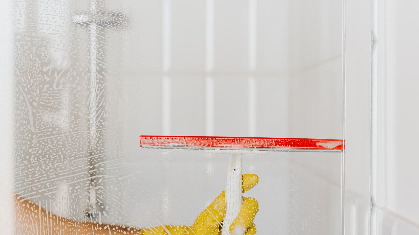How to Keep Glass Shower Doors Free of Soap Scum and Water Spots