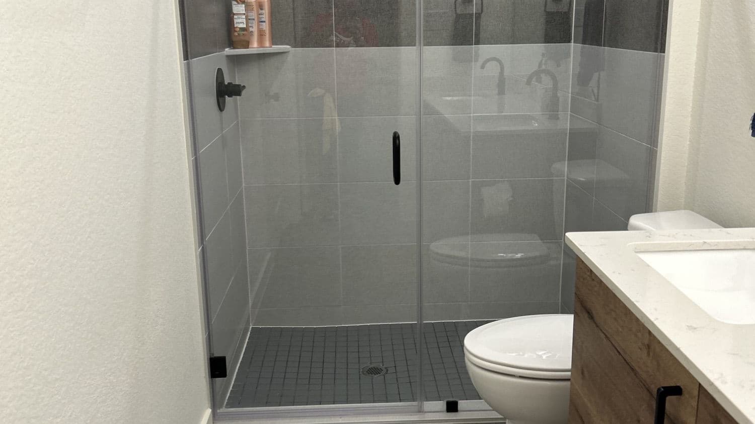 Clean glass shower after a visit from YGB Cleaning Services